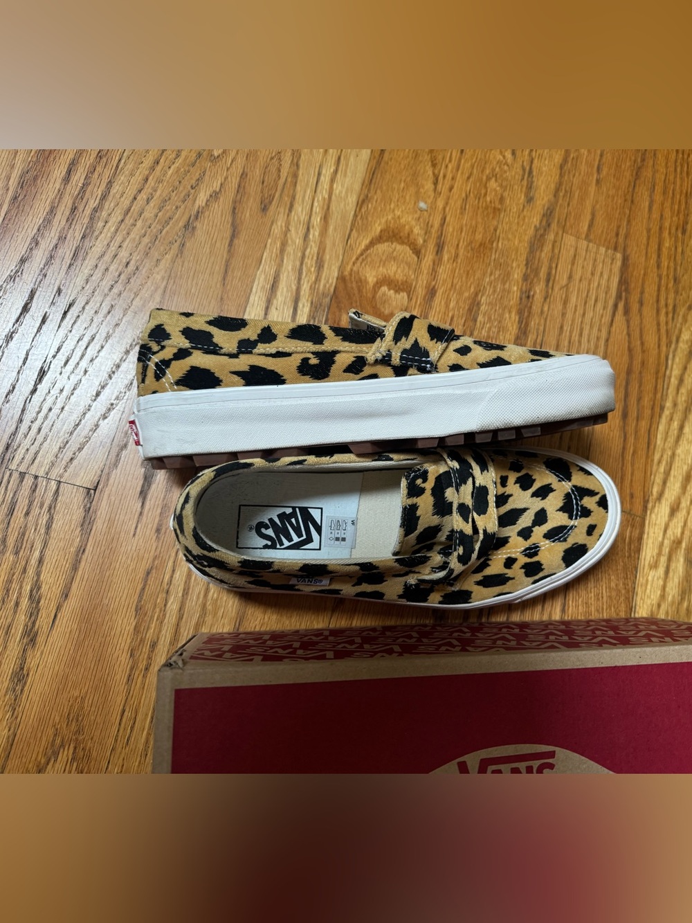 Vans women’s Slip-On Sneakers in Leopard Print Tan and Black